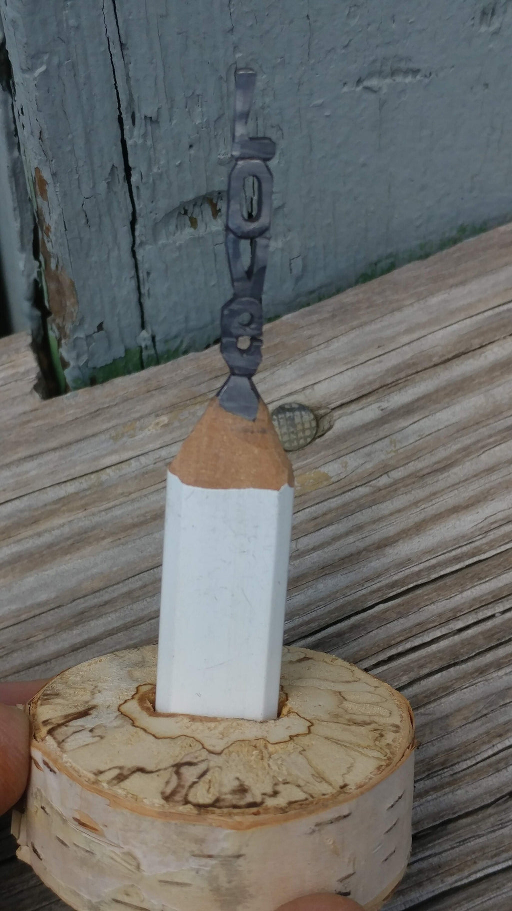 Pencil Lead Art. LOVE in a custom stand.