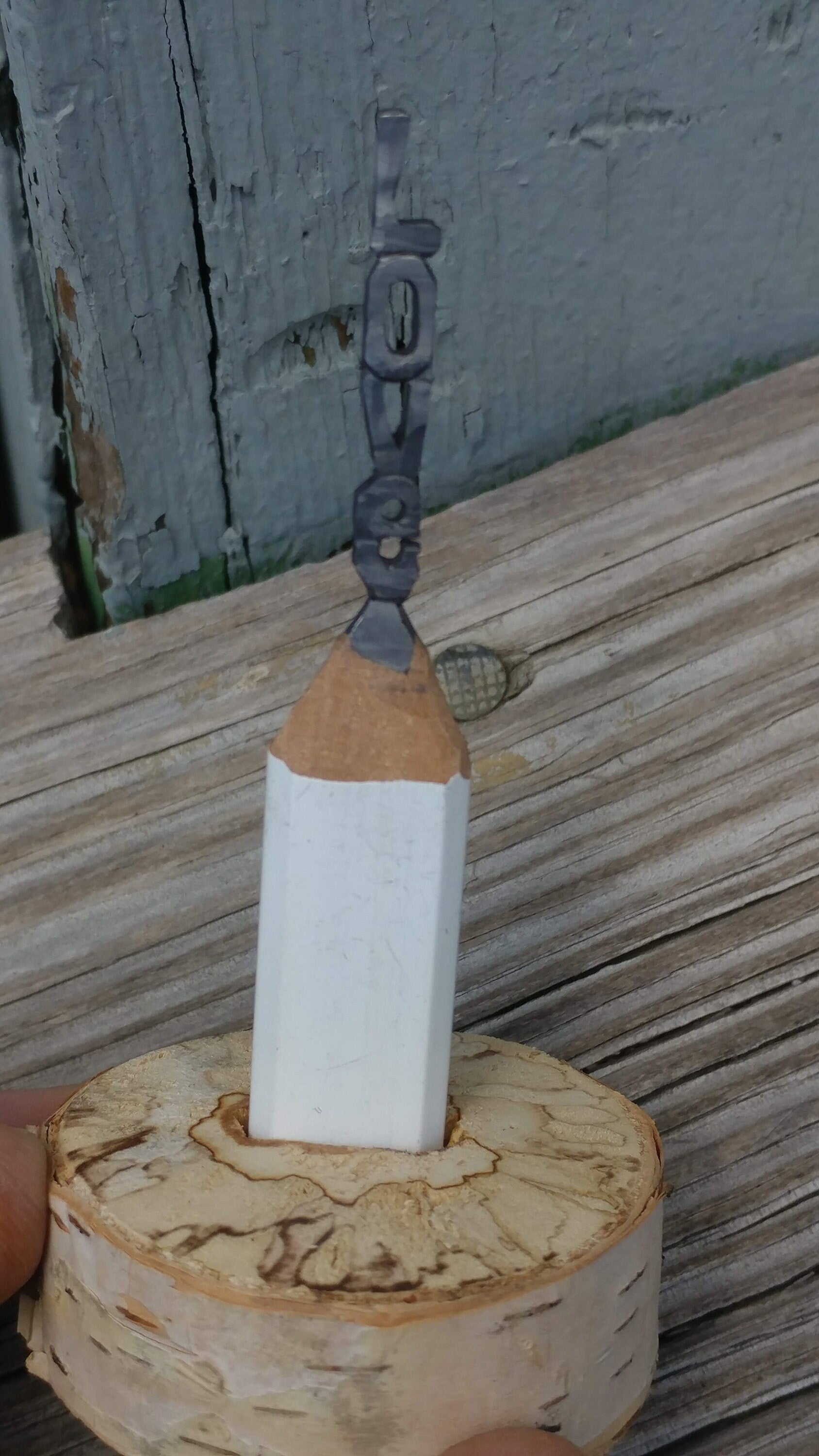 Pencil Lead Art. LOVE in a custom stand.
